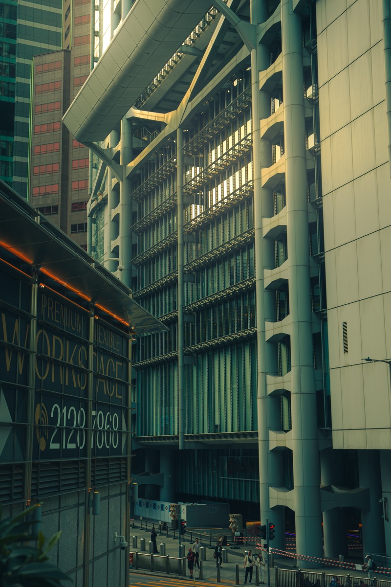 Sunlit modern skyscrapers on Hong Kong Island with urban cityscape elements