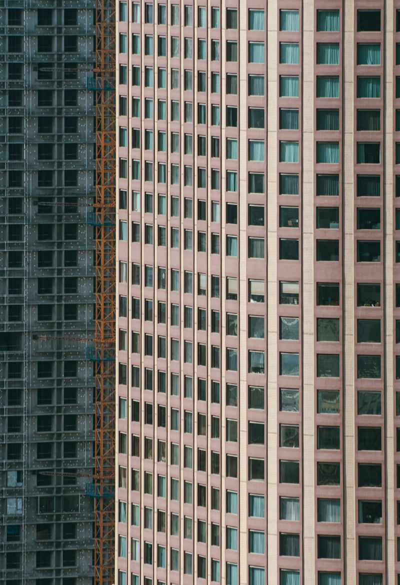 Close-up view of contemporary skyscraper facade with repeating grid pattern